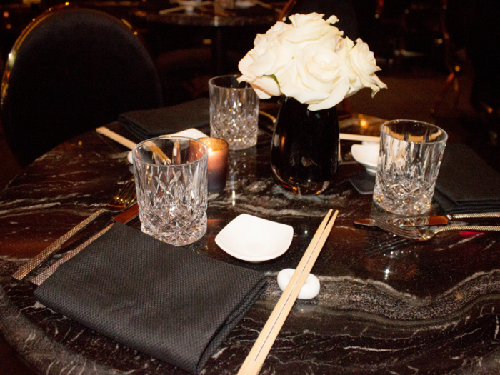 The Playboy Bar has several dining tables and booths where guests can order from a menu created by Notar.