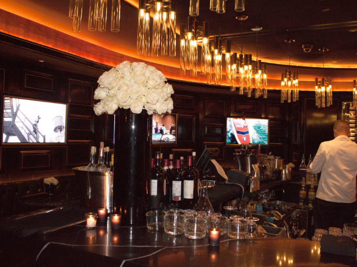 Bouquets of white roses decorated the bar — a fancy touch that I don