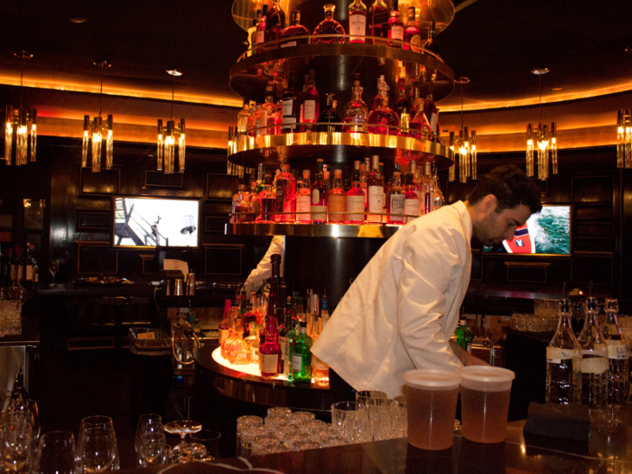 Staff members dressed in white suits were prepping the bar.