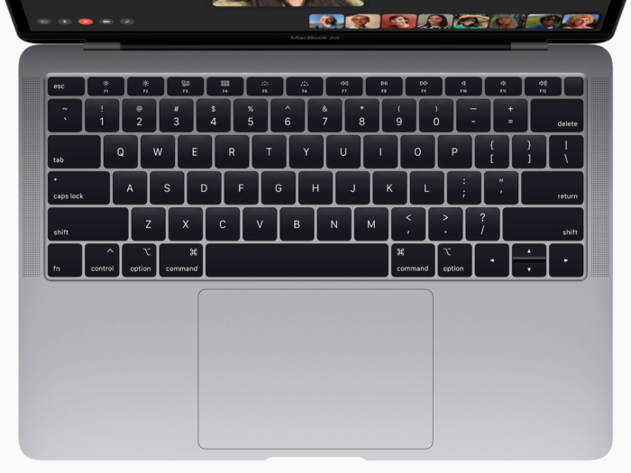 Both laptops have similar keyboards and trackpads.