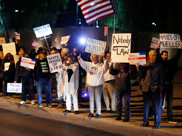 Protestors cheer during a demonstration in support of Mueller in Las Vegas, Nevada.