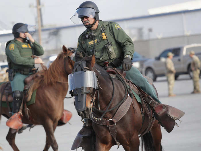 Some are mounted on horses with visors.