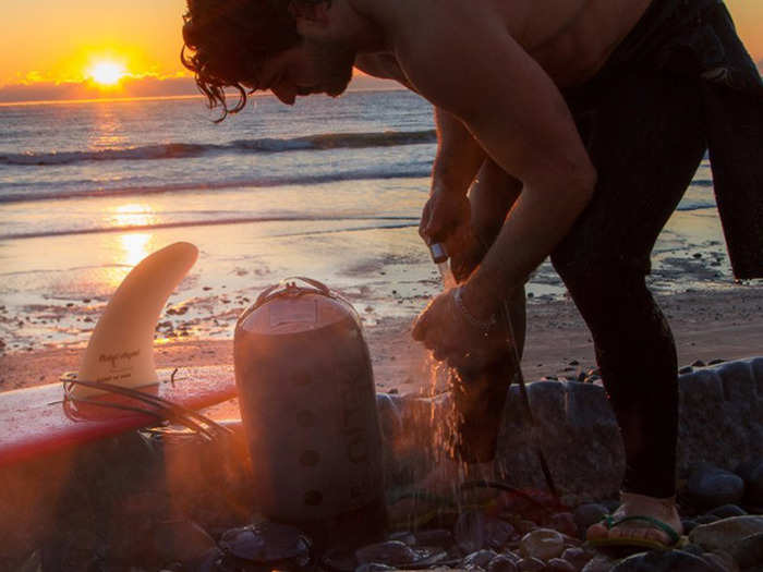 A solar-heated, pressurized portable shower system