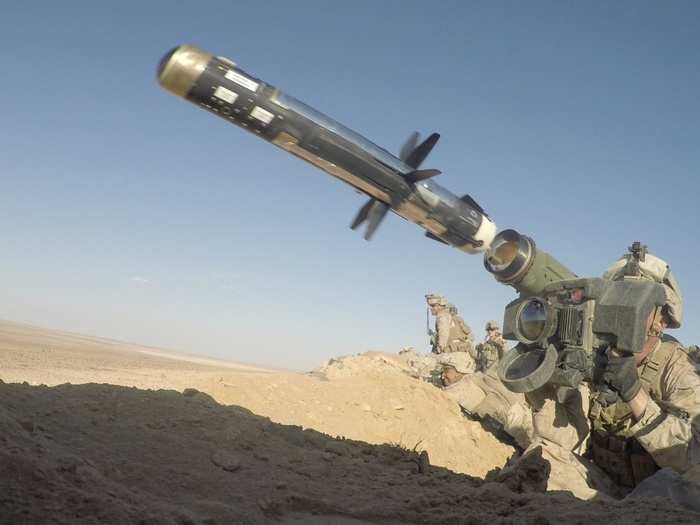 A US Marine with 3d Battalion, 7th Marine Regiment, attached to Special Purpose Marine Air-Ground Task Force, Crisis Response-Central Command, fires a shoulder-fired anti-tank missile at his target during a live-fire demonstration near At Tanf Garrison, Syria on Sept. 7, 2018.