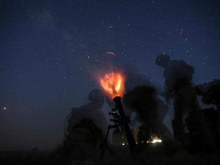 Marines fire an 81mm mortar during training in support of Operation Inherent Resolve in Hajin, Syria on August 4, 2018.