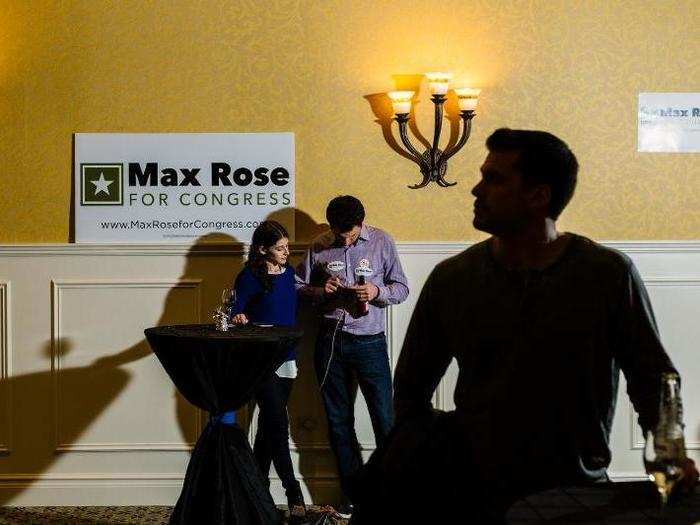 A few dozen supporters and staff mingled in the large room filled with balloons, nursing their drinks as they frantically scanned the local TV election coverage and their phones.