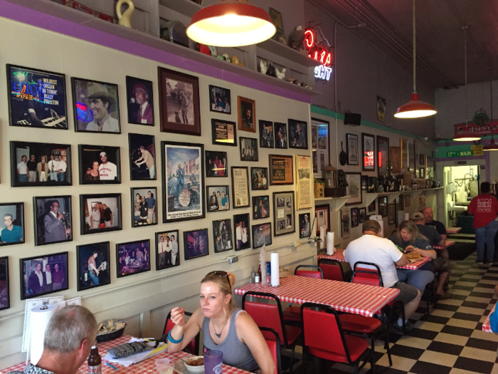 The walls were covered in framed photos.