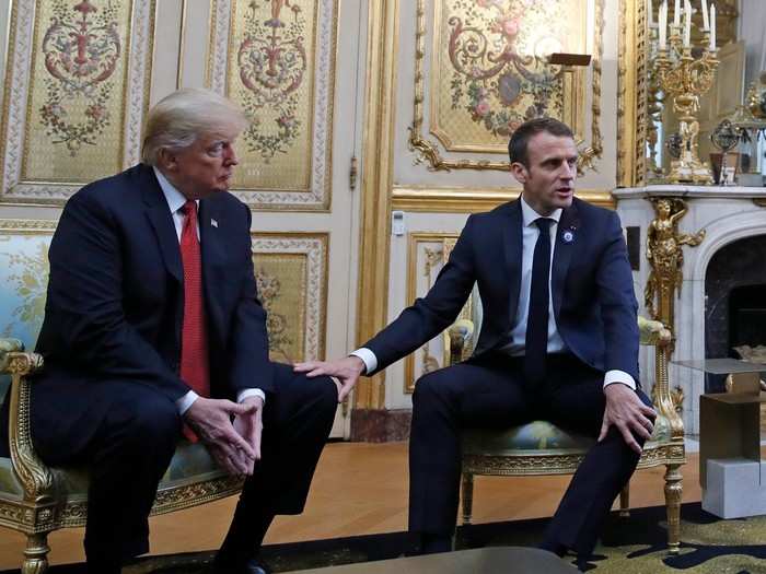 Macron seemed to try to convey a cooperative image by touching Trump