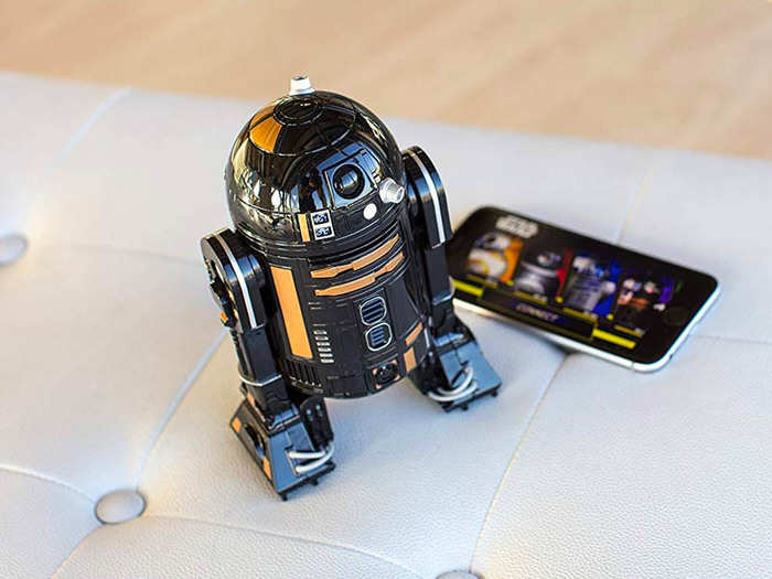 An R2-Q5 droid that can zip around their floor and makes real droid sounds