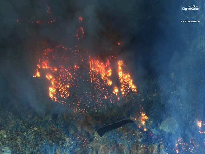 This WorldView-3 image shows the same view of Paradise on Friday, in flames.