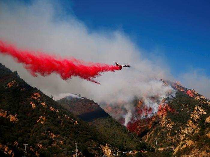 Local authorities have deployed water and flame retardant to try and quell the fire.