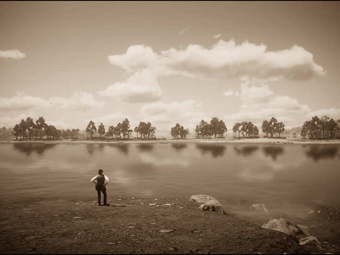 Dutch van der Linde, the leader of the notorious Van der Linde Gang, enjoys a moment of solitude.