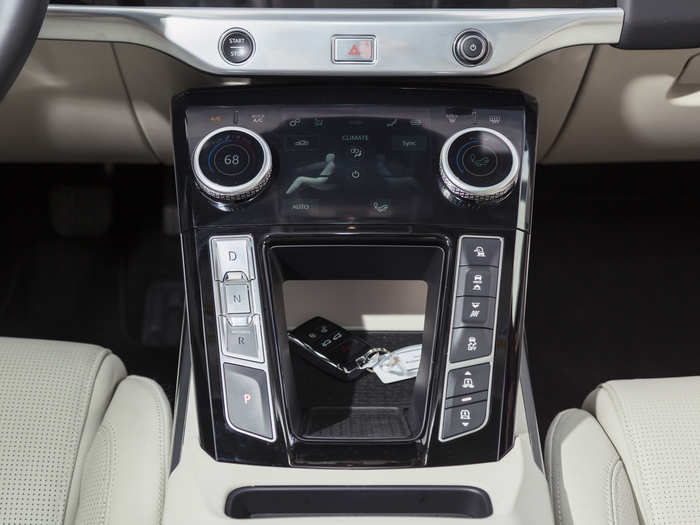 ...Secondary screen mound lower on the center stack. The top screen takes care of the infotainment functions while the lower screen handles the climate control and cabin comfort features. The dual screen set up is elegant and effect