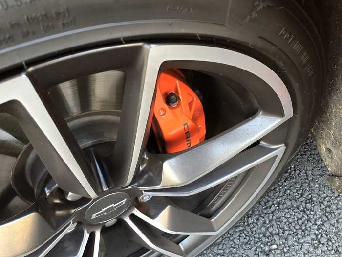 Complete with custom, orange Brembo brake calipers.