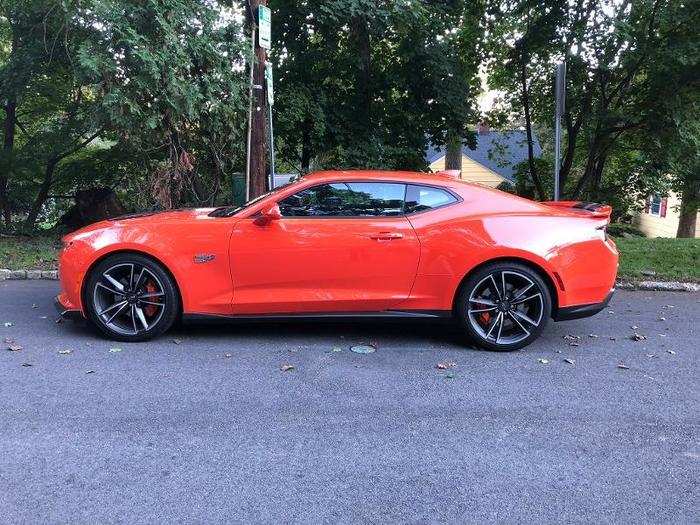 With its high beltline, bold rear haunches, low-slung stance, and overall spirit of throwback, muscle-car aggressive — not to mention the orange paint job — the Camaro SS makes a statement, anywhere and everywhere.