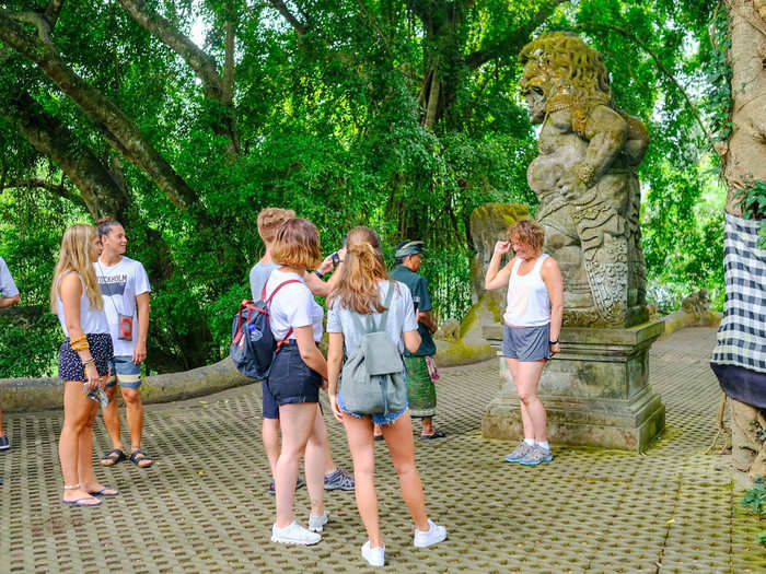 Outside the temple, you can have a staff member help you get that monkey selfie you