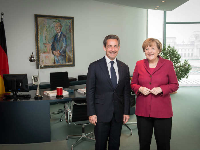 German Chancellor Angela Merkel and former French president Nicholas Sarkozy