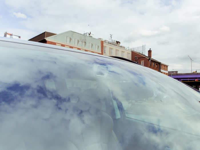 Also located above the rear-view mirror are the sensors for Subaru