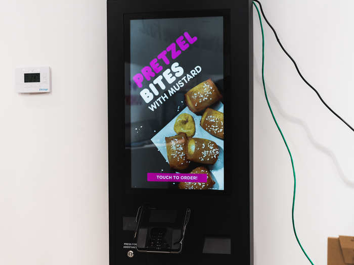 The digital ordering kiosks would allow customers to view the menu, place orders, and pay without interacting with anyone else in store.