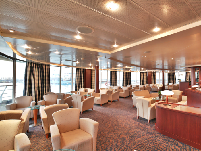 Passengers can relax and take in views of the sea or ports in plush observation areas.