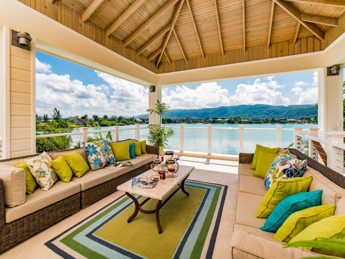 A beachfront villa with an infinity pool, outdoor bar, and full staff, including a professional chef, gardener, and nanny to watch the kids while you enjoy a cocktail made by the butler.