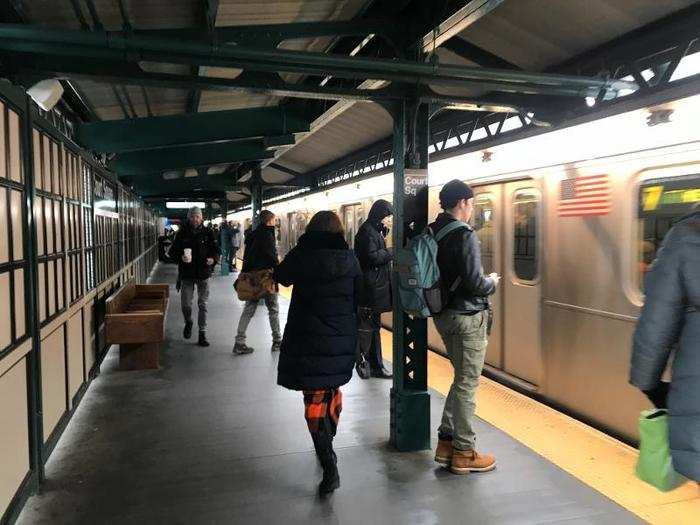 Back on the 7 train platform at Court Square, things have cleared out a bit (a train just left, and this stop is served by both local and express service.) Still, every train that pulls in is packed to the gills.