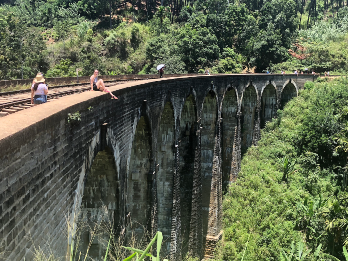 On our second day in Ella, we hiked to the Nine Arches Bridge — one of the most famous railway bridges in the world — that was constructed by the British in 1921. The area was full of tourists who sat daringly on the bridge