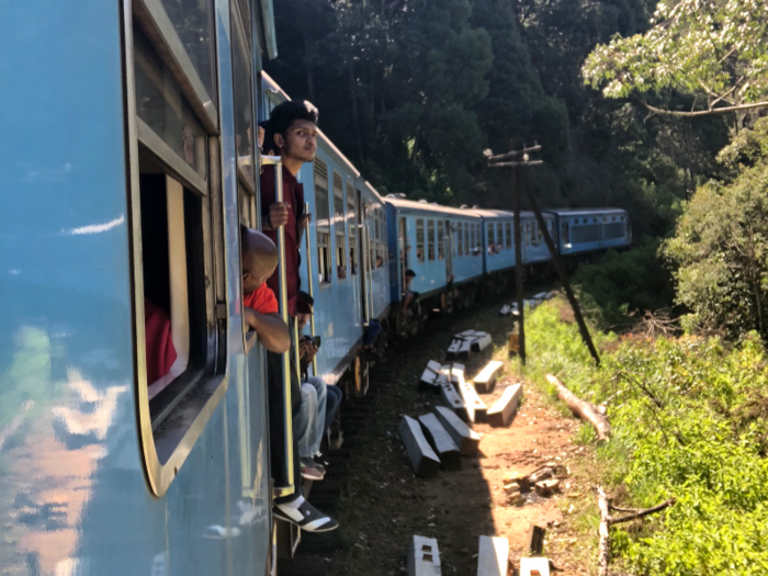 Some passengers — especially tourists — chose to hang out the side doors, which actually didn