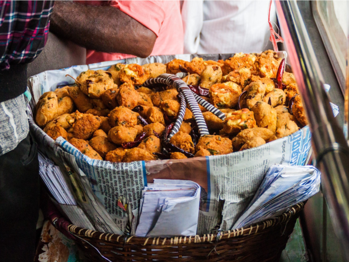 At various intervals, food vendors somehow weaved their way through the packed carriages offering everything from fried prawn balls, to spicy peanuts, to fresh fruit.