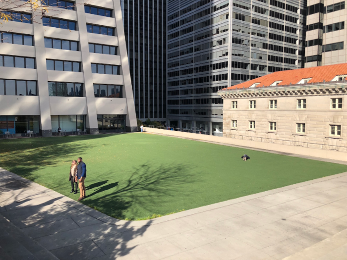 Behind me was a small, neatly manicured grass lawn that sometimes plays host to performances and organized events.