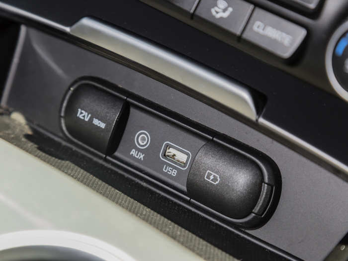 Check this out! Dedicated ports for 12-volt and USB charging, along with USB and Aux ports for media input. More automakers should provide this option.