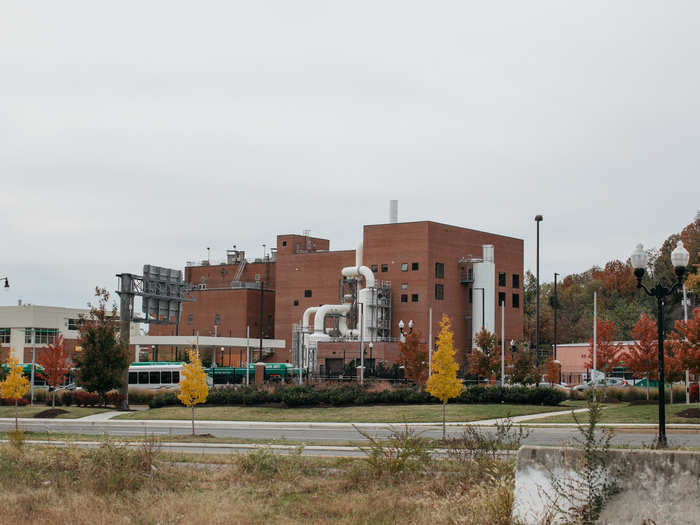 On the opposite side of Route 1 there are factories and large warehouses.