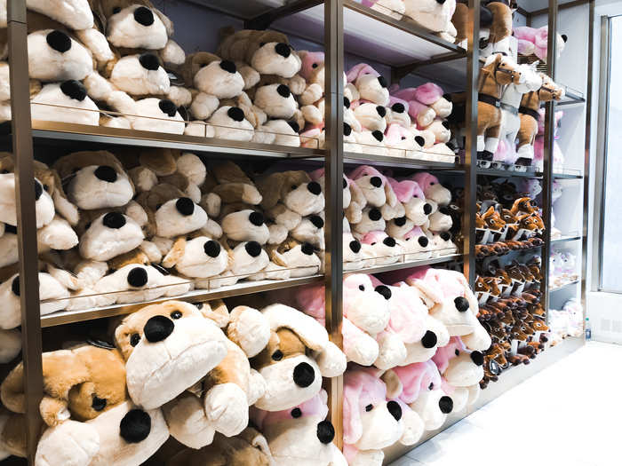 The front of the store is lined with stuffed animals.