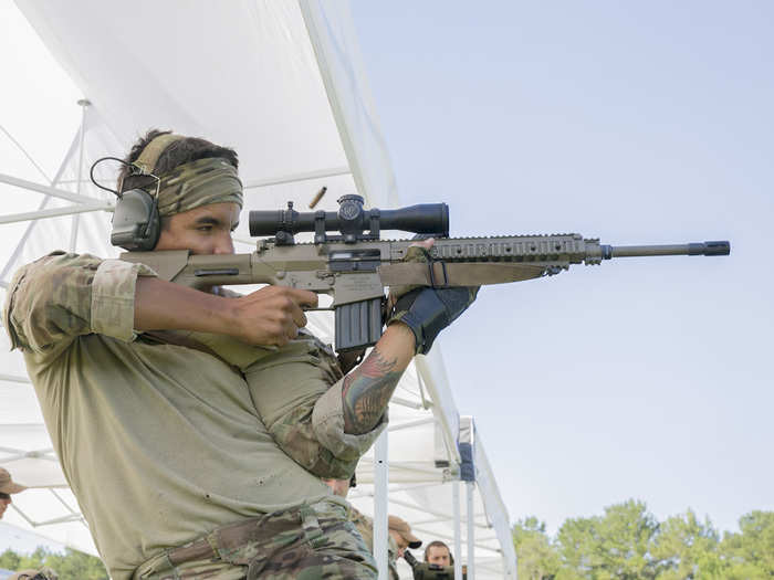 Though their area of operation is the sea, Coast Guard marksmen do train on land.