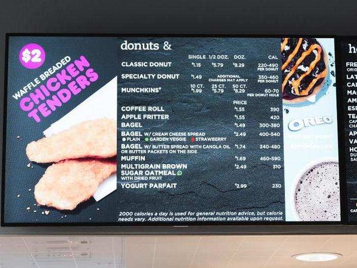 The bakery items are also listed on digital menu boards above the counter.