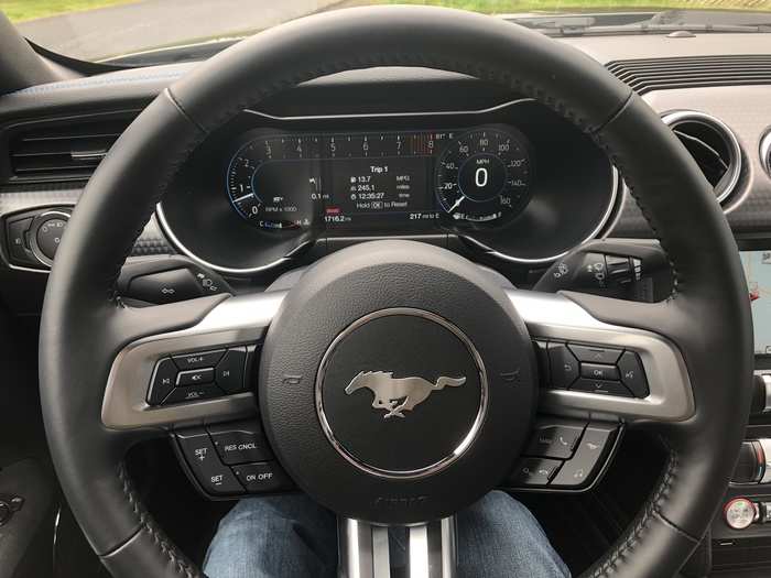 The instrument cluster is a digital-analog affair. My test car also had a leather-wrapped steering wheel.