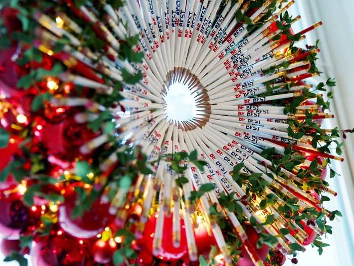 Details include a Christmas wreath made out of "Be Best" pencils, bearing the name of the childhood wellness initiative the first lady unveiled earlier this year.