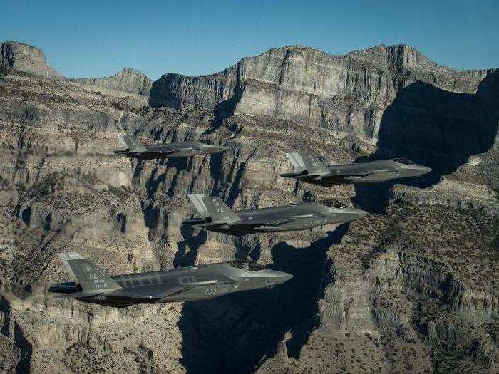 A formation of F-35 Lightning II stealth fighters from the 388th and 419th Fighter Wings stationed at Hill Air Force Base perform aerial maneuvers as part of a combat power exercise over Utah Test and Training Range on Nov. 19, 2018.