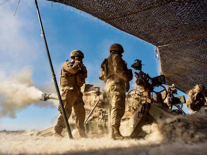 Marines with 3rd Battalion, 11th Marine Regiment,  1st Marine Division fire an M777 Howitzer at known targets during training at Mount Bundey Training Area, Australia on August 9, 2018.