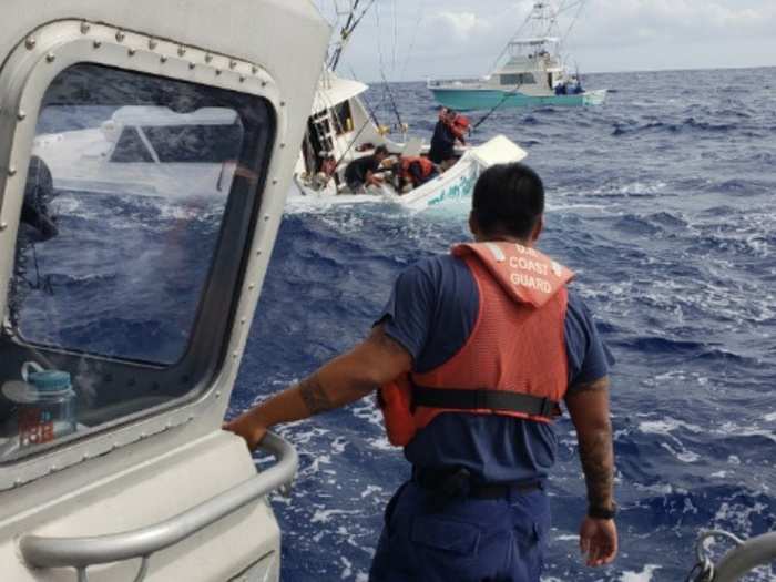 A U.S. Coast Guard Station Honolulu 45-foot Response Boat Medium crew responds to a sinking charter boat off Ewa Beach, Hawaii on Oct. 28, 2018.