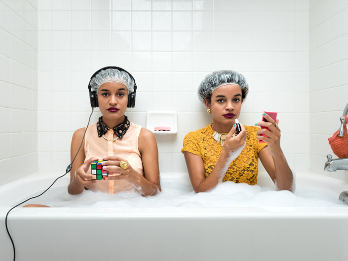 Like into a small bathroom to photograph a set of twins in a bathtub ...