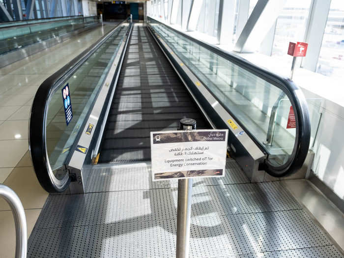 The travelators, as they are known officially, only run when you step onto them to save energy. I