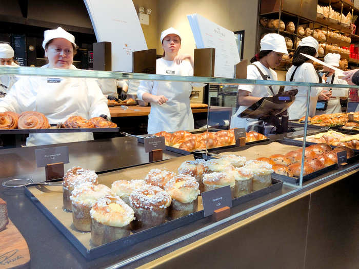 Everything behind the glass counters was fresh out of the oven. The bakery cases were full of cinnamon rolls, muffins, croissants ...