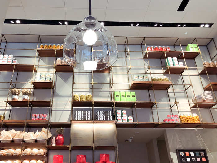 Behind the counter was a 20-foot wall of ingredients that stretches up to the ceiling. It had jars of fruits and vegetables, dried flowers, and fresh bread.