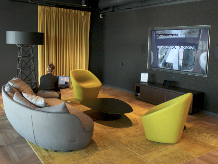 We walked through the café to the game room, which includes a TV and video gaming consoles ...