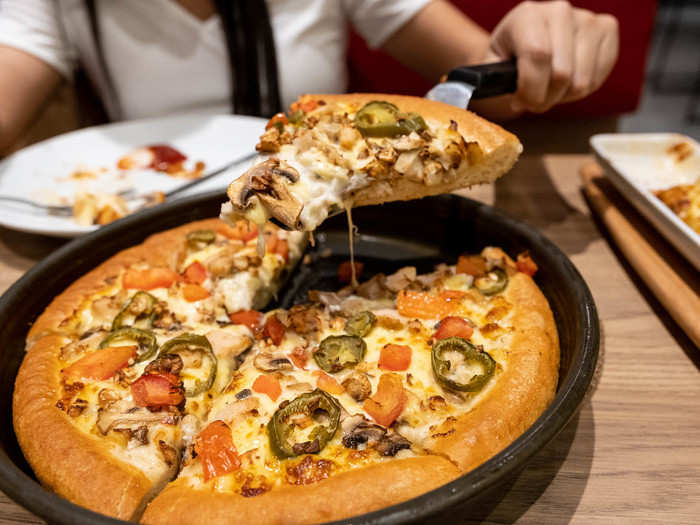 Look at that cheese pull! I have to say, this did not disappoint. The crust and dough had the perfect, buttery crisp — that exact same bite I dreamed of for my family