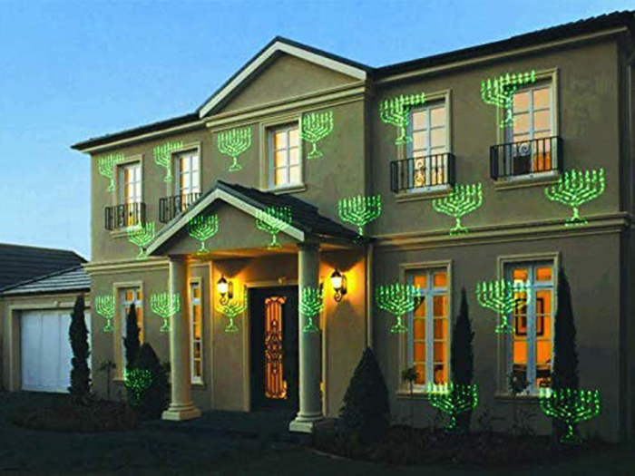 Laser lights that project little menorah, dreidels, or sparkles onto your house