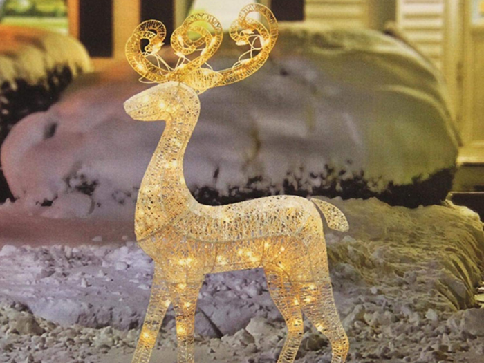 A lighted white glitter reindeer