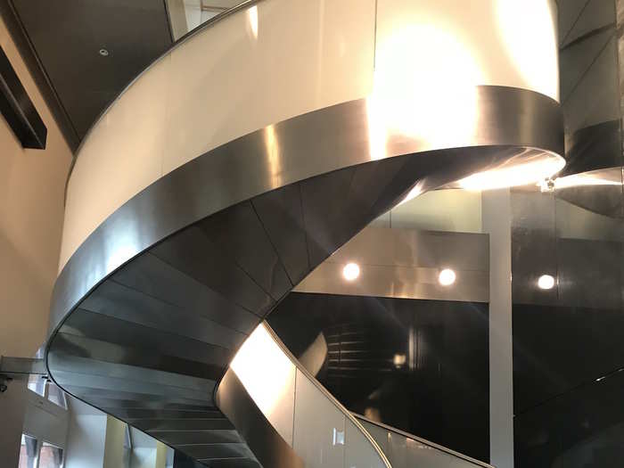 This impressive spiral staircase leads you to the second floor — but there