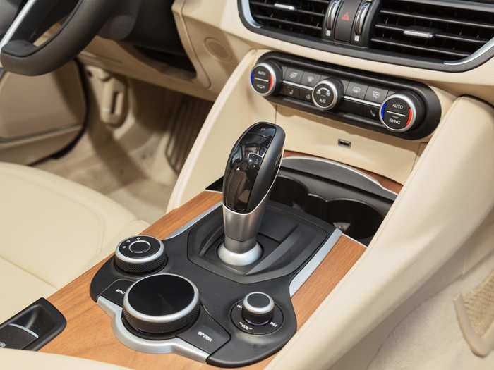  The joystick shifter takes some getting used to, and it shares space with the Giulia